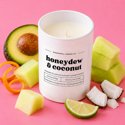 Handmade Sugarspell Honeydew & Coconut candle styled with fresh tropical fruit