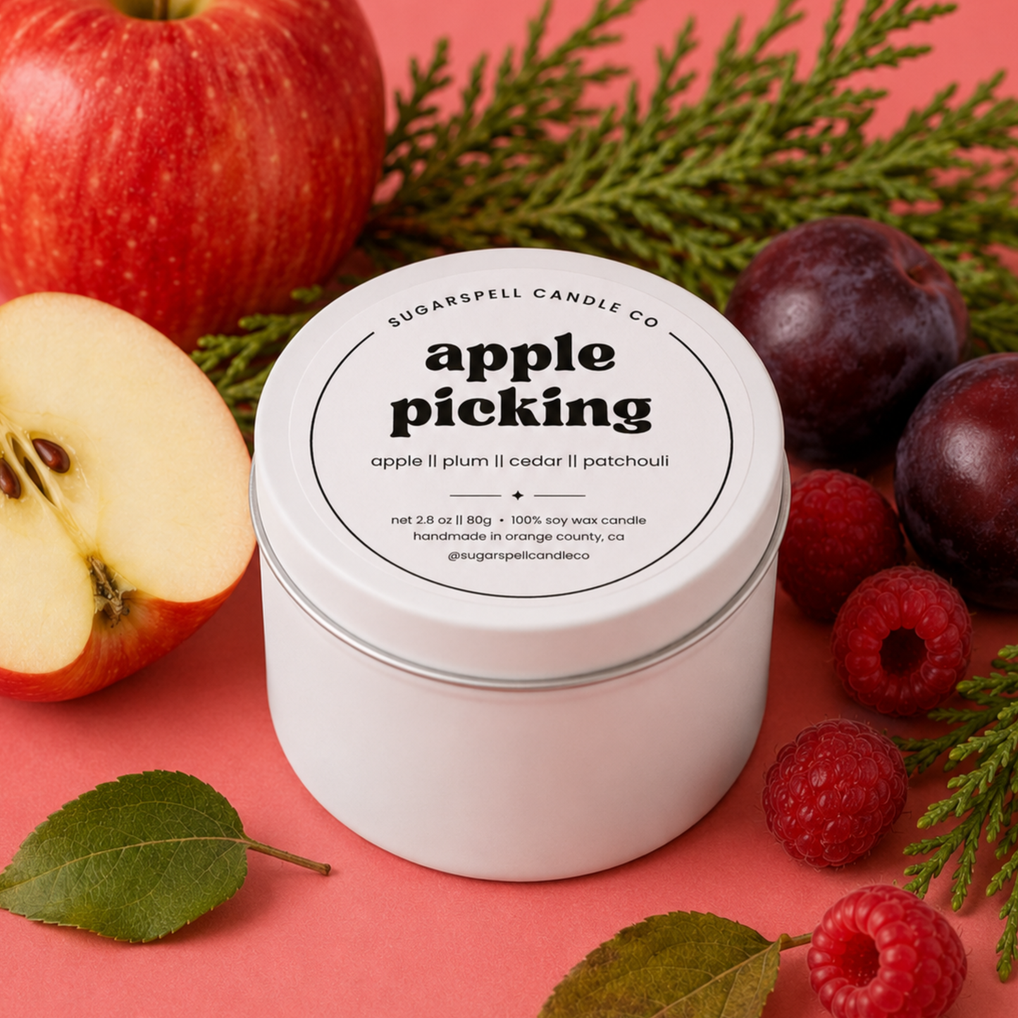Handmade Apple Picking mini candle tin styled with apples, plums, raspberries and evergreen