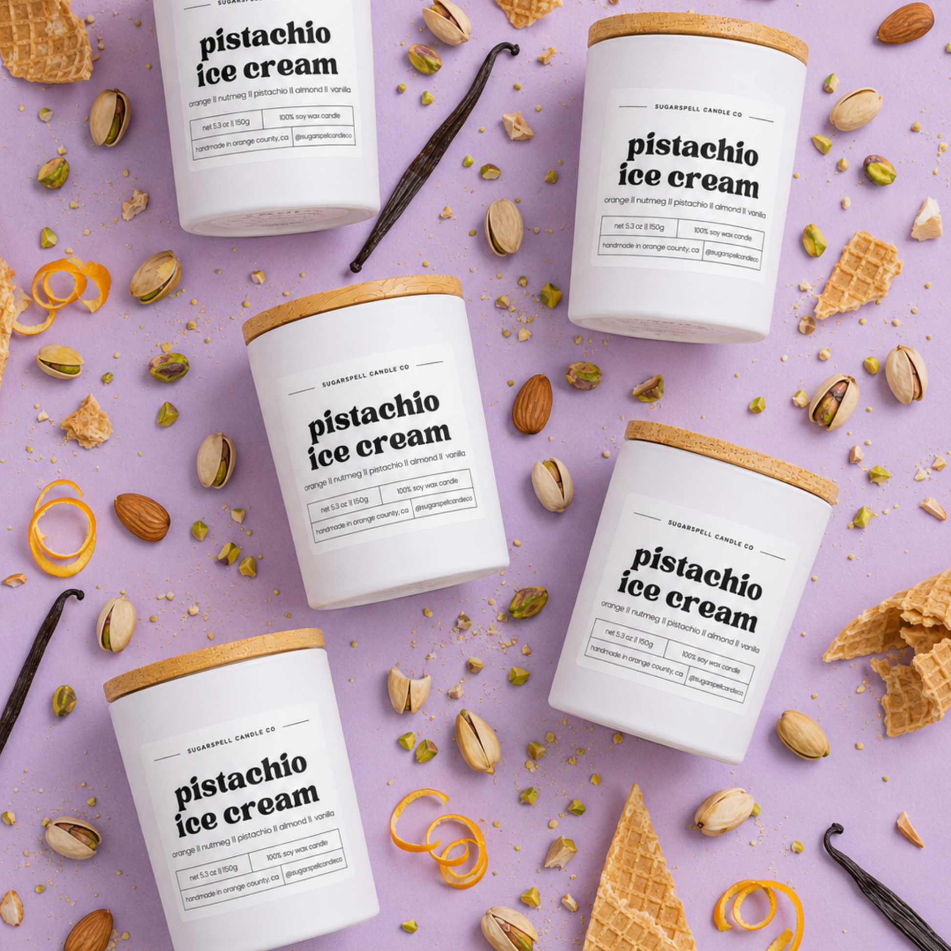 Flat lay of handmade Pistachio Ice Cream candles with pistachios and waffle cone pieces